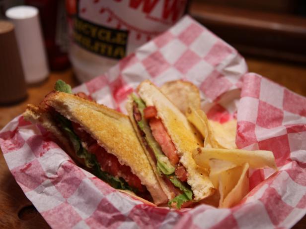 Robert's Western World signature dishes Fried Bologna SandwichThe Recession Special (Fried Bologna Sandwich, Chips, Moon Pie, PBR)CheeseburgerHot Dog